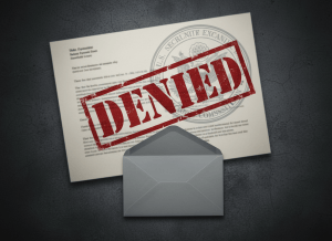 A stark, bureaucratic editorial image for an investigative article about a FOIA request to the SEC being denied expedited processing. Dark charcoal background. Ghosted imagery of a formal government letter, an SEC seal watermark, and a bold red stamp reading "DENIED" at a slight angle. Faint document text bleeds through as background texture. A single envelope silhouette sits open in the lower third, suggesting a request sent and answered coldly. Mood: institutional stonewalling, regulatory opacity, FOIA journalism, serious investigative reporting. No cartoonish elements.